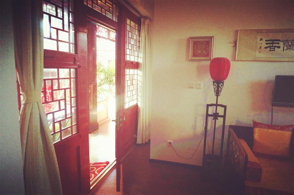 Templeside Deluxe Hutong Hotel Pekín Habitación foto